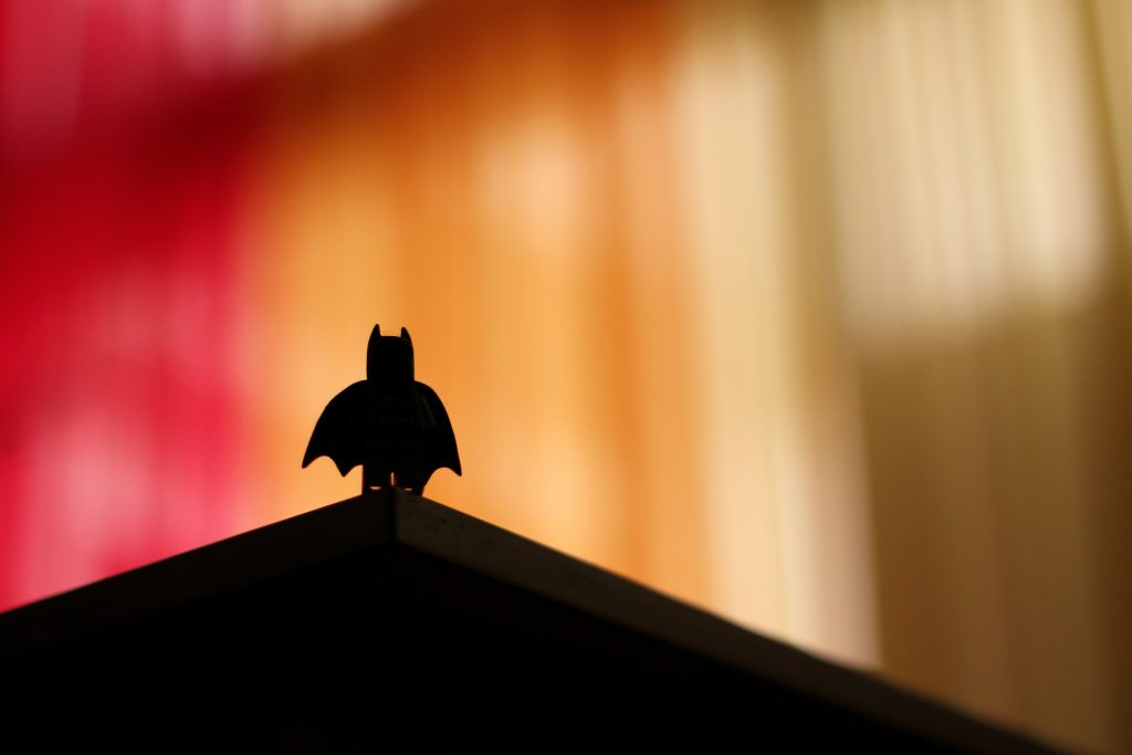 Simple sillouette of batman on a hill
