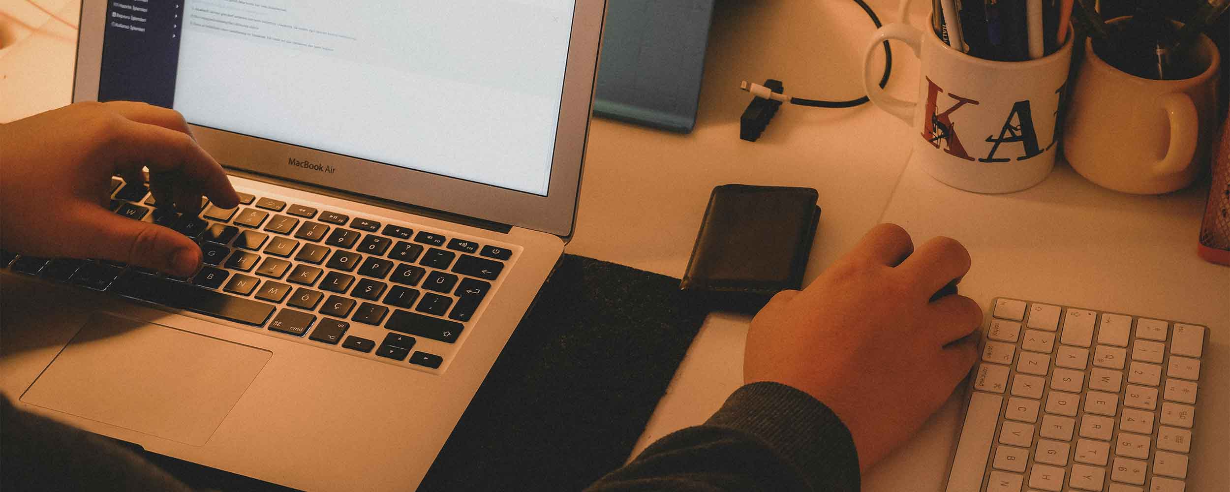 A small business owner working on their wordpress webite. WordPress is the ideal website platform for small businesses.