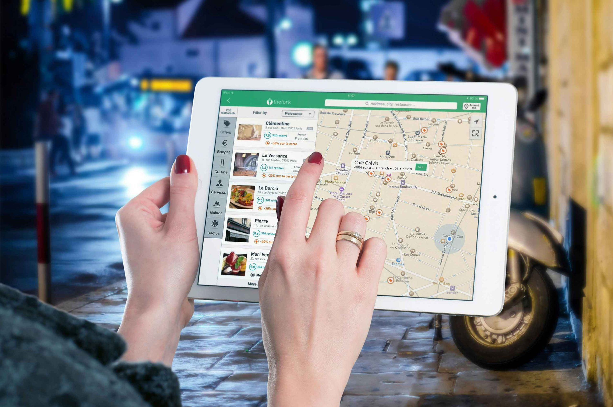 Someone using Google Maps on a iPad